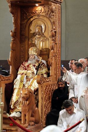 Pope Shenouda on throne dead.jpg